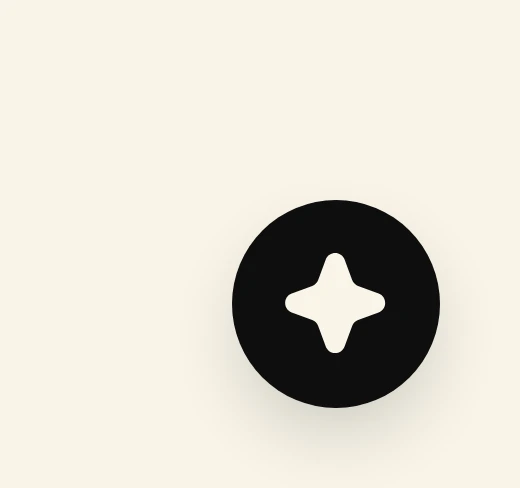 A round black button with a star on it, in the bottom right corner of a web page